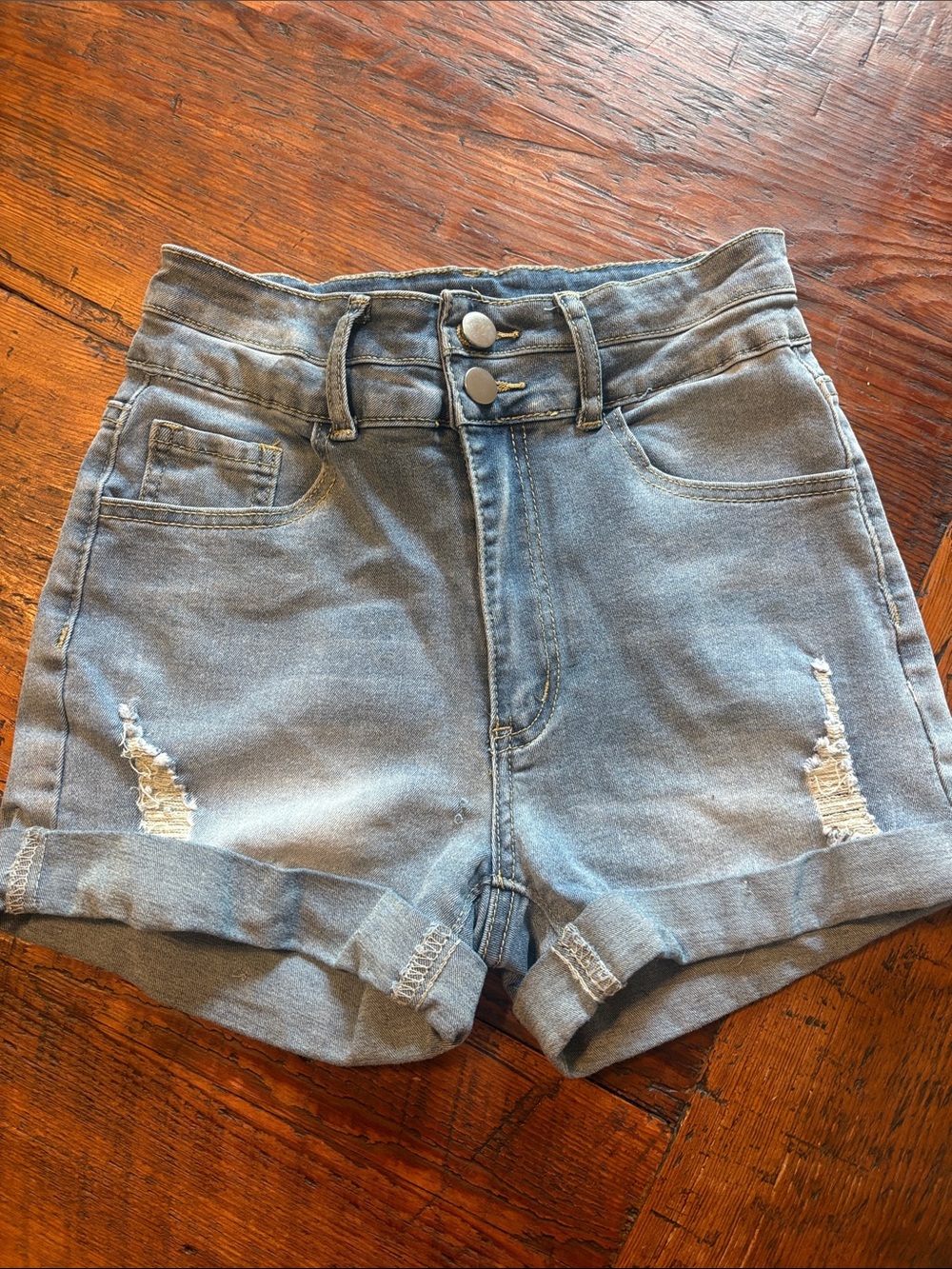 High-Waist Light Blue Distressed Denim Shorts with Rolled Hem